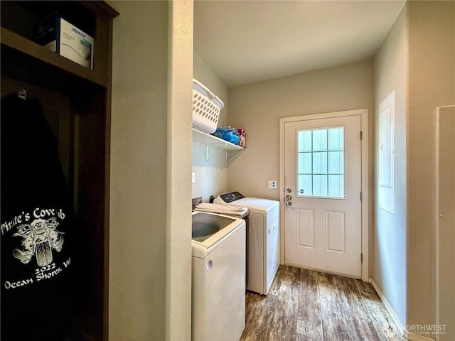 642 Weatherwax Loop NE, Ocean Shores, WA 98569 - laundry room with washer and dryer and light wood-style flooring