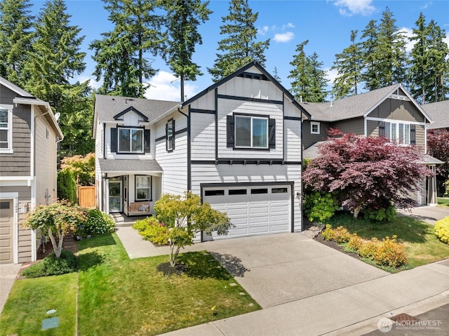 11226 Borgen Loop, Gig Harbor, WA 98332 - view of front of house with board and batten siding, an attached garage, driveway, and a front lawn