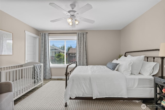 11226 Borgen Loop, Gig Harbor, WA 98332 - bedroom featuring wood finished floors and ceiling fan