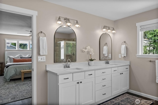 11226 Borgen Loop, Gig Harbor, WA 98332 - full bath with ensuite bathroom, double vanity, plenty of natural light, and a shower stall