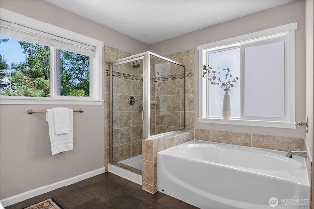 11226 Borgen Loop, Gig Harbor, WA 98332 - bathroom featuring plenty of natural light, a garden tub, a stall shower, and tile patterned floors