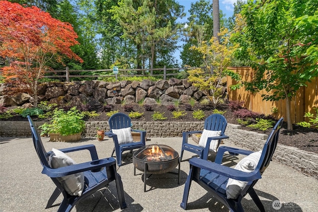 11226 Borgen Loop, Gig Harbor, WA 98332 - view of patio with an outdoor fire pit
