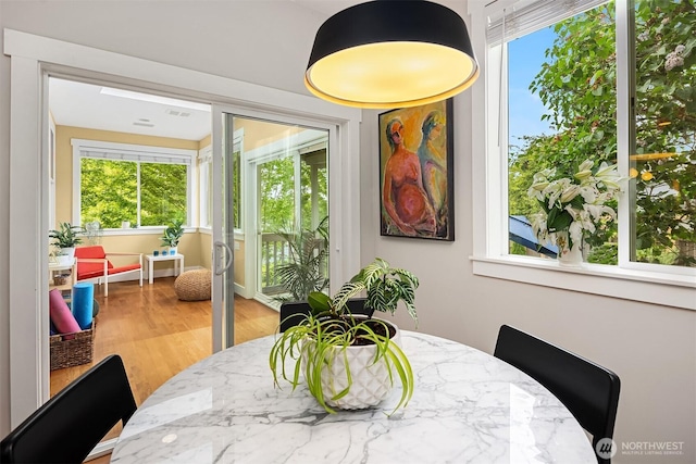 5102 S Frontenac St, Seattle, WA 98118 - dining space with wood finished floors