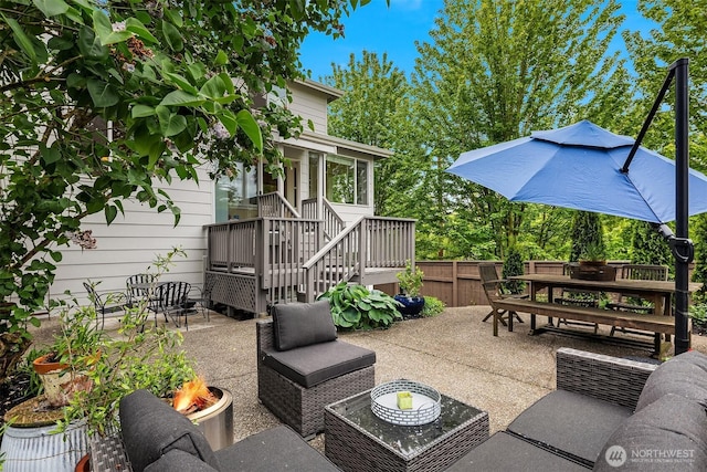 5102 S Frontenac St, Seattle, WA 98118 - view of patio featuring outdoor dining space and an outdoor living space with a fire pit