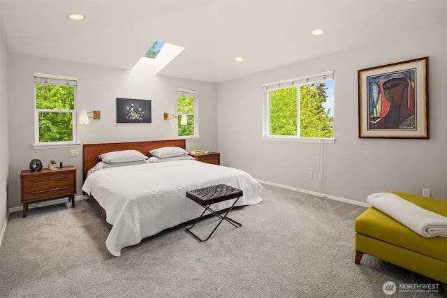 5102 S Frontenac St, Seattle, WA 98118 - bedroom with a skylight, carpet flooring, baseboards, and recessed lighting