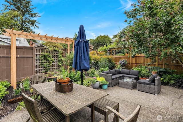 5102 S Frontenac St, Seattle, WA 98118 - fenced backyard featuring outdoor lounge area, a patio area, and outdoor dining space