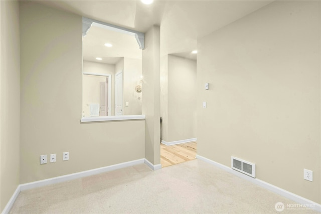 225 4th Ave Unit A307, Kirkland, WA 98033 - carpeted spare room featuring baseboards and recessed lighting