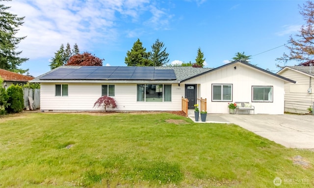 17801 111th Ave SE, Renton, WA 98055 - ranch-style house with roof mounted solar panels and board and batten siding