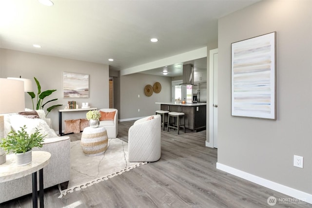 17801 111th Ave SE, Renton, WA 98055 - living room with baseboards, wood finished floors, and recessed lighting