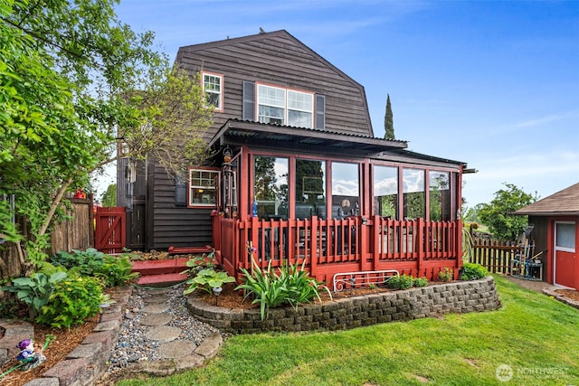 1656 Bishop Rd, Chehalis, WA 98532 - rear view of house with a sunroom and a deck