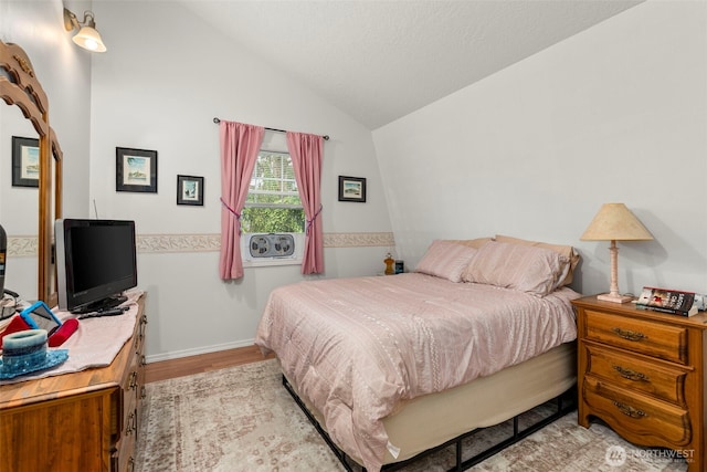 1656 Bishop Rd, Chehalis, WA 98532 - bedroom with light wood-type flooring, lofted ceiling, and baseboards