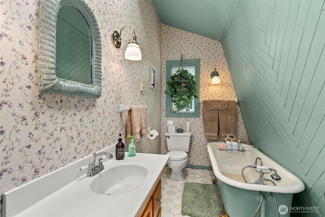 1656 Bishop Rd, Chehalis, WA 98532 - full bathroom featuring wallpapered walls, lofted ceiling, a soaking tub, tile patterned floors, and toilet