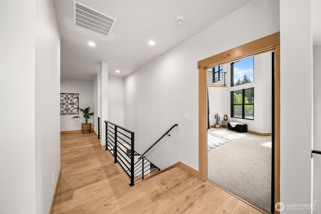 91 Pebble Beach Dr, Cle Elum, WA 98922 - hall featuring an upstairs landing, recessed lighting, baseboards, and light wood-type flooring