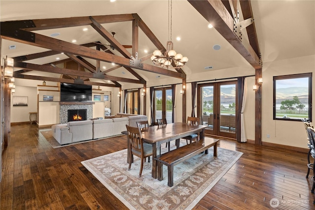 510 Lakeside Way SW, Mattawa, WA 99349 - dining area with french doors, a fireplace, baseboards, beam ceiling, and high vaulted ceiling