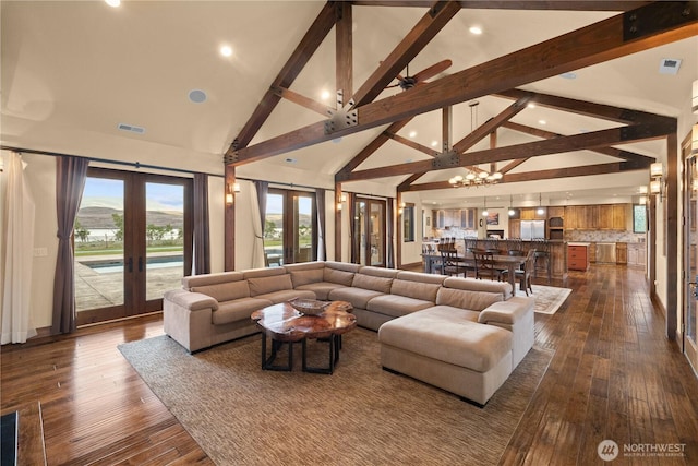 510 Lakeside Way SW, Mattawa, WA 99349 - living room featuring high vaulted ceiling, french doors, dark wood finished floors, a chandelier, and recessed lighting