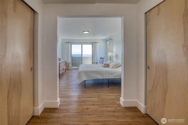 1472 Storm King Ave SW Unit A, Ocean Shores, WA 98569 - bedroom with wood finished floors and baseboards