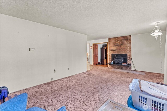 9712 126th St E, Puyallup, WA 98373 - unfurnished living room with carpet floors and a textured ceiling