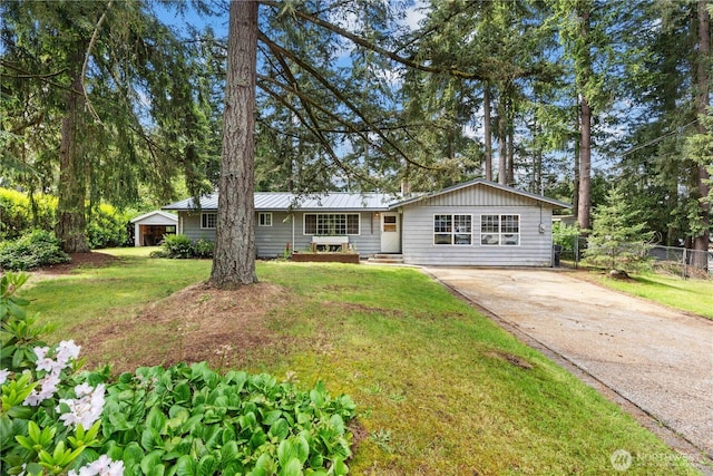 9712 126th St E, Puyallup, WA 98373 - ranch-style home with driveway and metal roof