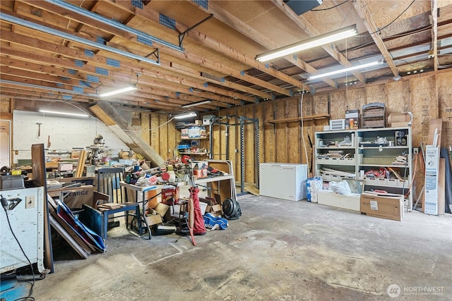 9712 126th St E, Puyallup, WA 98373 - below grade area featuring a workshop area and fridge