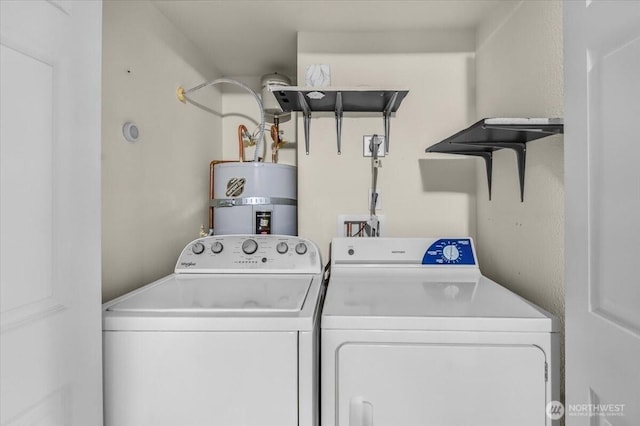 13013 E Gibson Rd Unit M223, Everett, WA 98204 - laundry area with water heater and washer and clothes dryer
