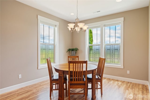 15 Cabana Dr, Silverlake, WA 98645 - dining area featuring light wood-type flooring, plenty of natural light, a chandelier, baseboards, and recessed lighting