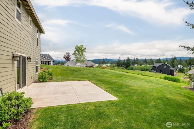 15 Cabana Dr, Silverlake, WA 98645 - view of grassy yard featuring a patio area and a mountain view