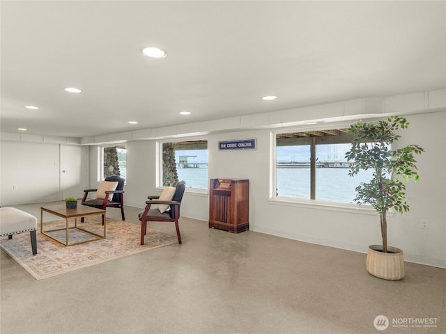 8609 E Caraway Rd, Port Orchard, WA 98366 - living area featuring recessed lighting, plenty of natural light, baseboards, and a water view