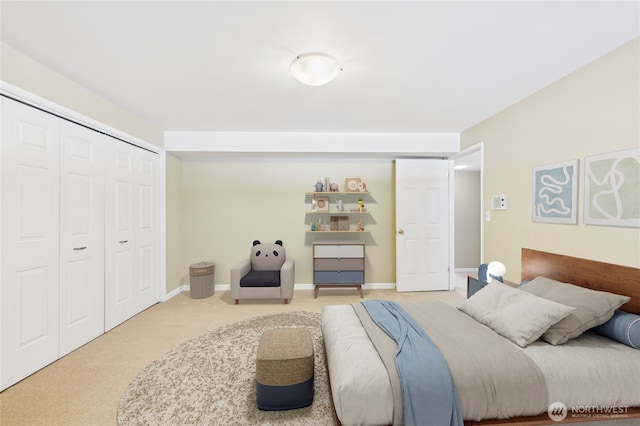 1323 121st Ave SE, Bellevue, WA 98005 - bedroom with carpet floors, a closet, and baseboards
