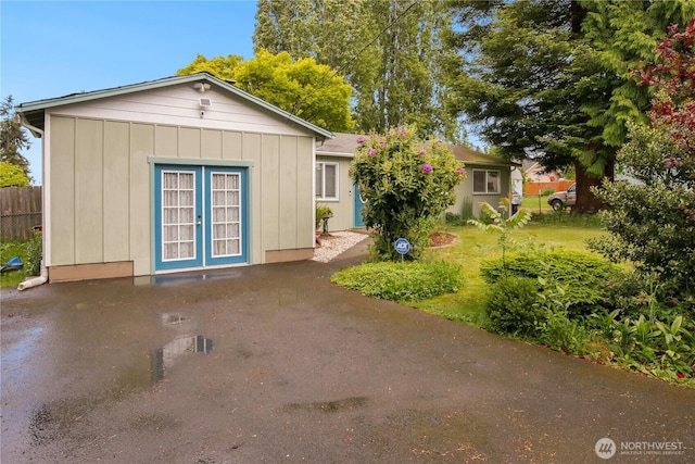 2018 S 253rd St, Des Moines, WA 98198 - rear view of property featuring board and batten siding
