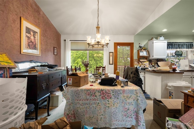 26603 199th Pl SE, Covington, WA 98042 - dining area with a chandelier, light carpet, and lofted ceiling