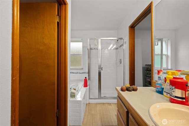 26603 199th Pl SE, Covington, WA 98042 - full bathroom featuring a stall shower, a bath, vanity, and healthy amount of natural light