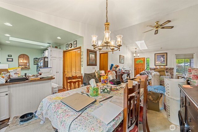 26603 199th Pl SE, Covington, WA 98042 - dining space with a chandelier, lofted ceiling, a ceiling fan, recessed lighting, and light colored carpet
