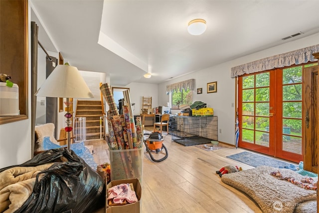 26603 199th Pl SE, Covington, WA 98042 - living area with french doors, wood-type flooring, and stairway