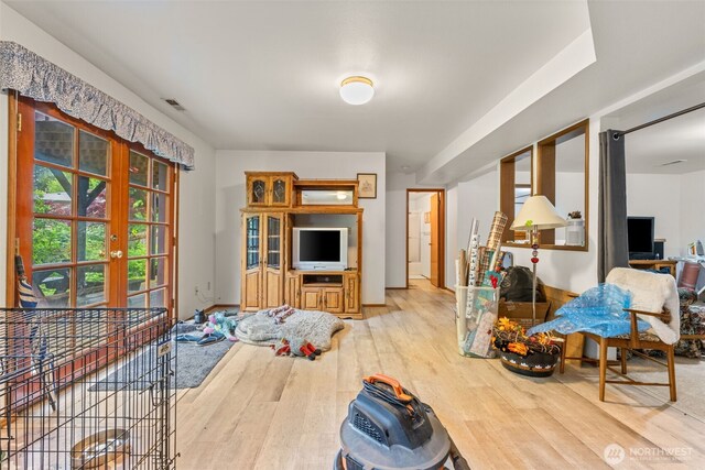 26603 199th Pl SE, Covington, WA 98042 - living area with wood finished floors and french doors