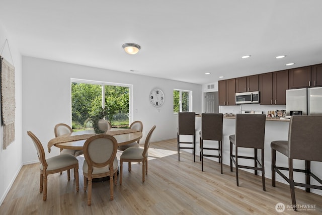 3905 S 337th St, Federal Way, WA 98001 - dining space with light wood-style flooring, recessed lighting, and baseboards
