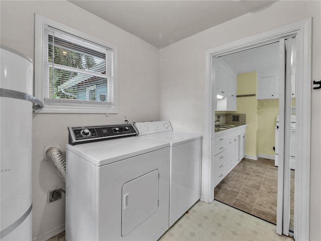 14746 26th Ave NE, Shoreline, WA 98155 - laundry room featuring washer and clothes dryer and light floors