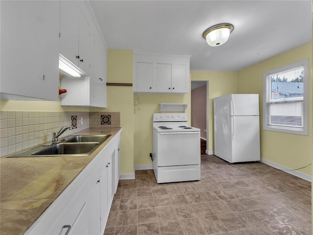 14746 26th Ave NE, Shoreline, WA 98155 - kitchen with white appliances, a sink, baseboards, decorative backsplash, and white cabinets