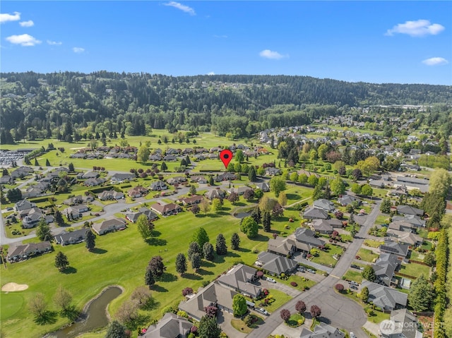 15002 147th Ave E, Orting, WA 98360 - aerial view of property's location featuring nearby suburban area, a forest, and a golf course