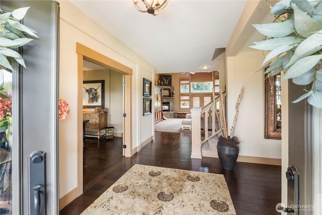 29122 71st Ave E, Graham, WA 98338 - foyer entrance with dark wood finished floors, baseboards, and stairs