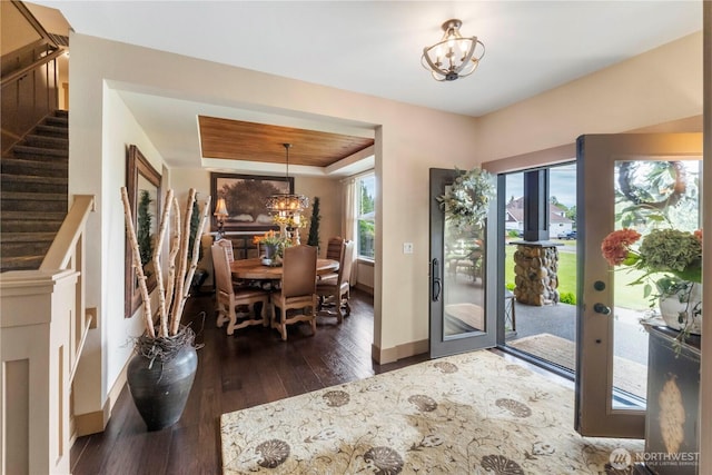 29122 71st Ave E, Graham, WA 98338 - entryway featuring a chandelier, dark wood finished floors, baseboards, stairway, and a raised ceiling