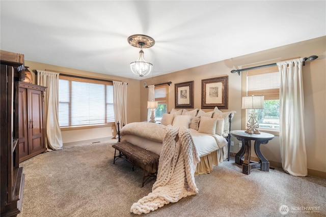 29122 71st Ave E, Graham, WA 98338 - bedroom featuring light colored carpet, a chandelier, and multiple windows