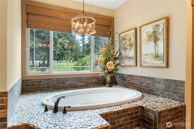 29122 71st Ave E, Graham, WA 98338 - full bathroom featuring a garden tub and a chandelier