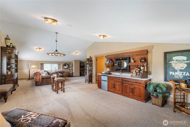 29122 71st Ave E, Graham, WA 98338 - living area with vaulted ceiling, light carpet, baseboards, and a chandelier