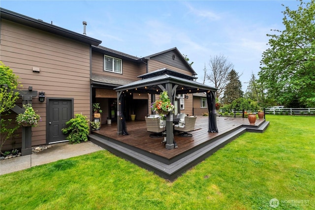 29122 71st Ave E, Graham, WA 98338 - deck featuring a gazebo and outdoor dining area