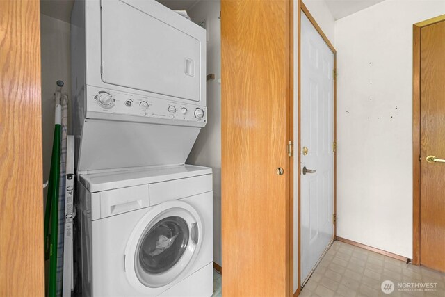 262 W Maberry Dr Unit 102, Lynden, WA 98264 - laundry room with stacked washing machine and dryer and light floors
