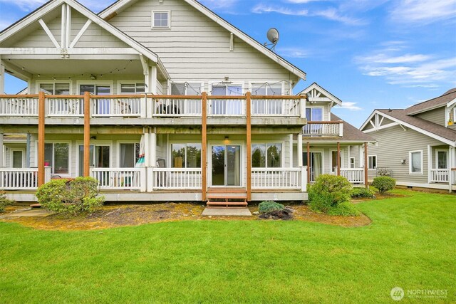 262 W Maberry Dr Unit 102, Lynden, WA 98264 - back of house featuring a balcony and a lawn