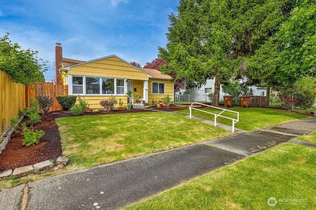 811 E 60th St, Tacoma, WA 98404 - bungalow-style home featuring a chimney
