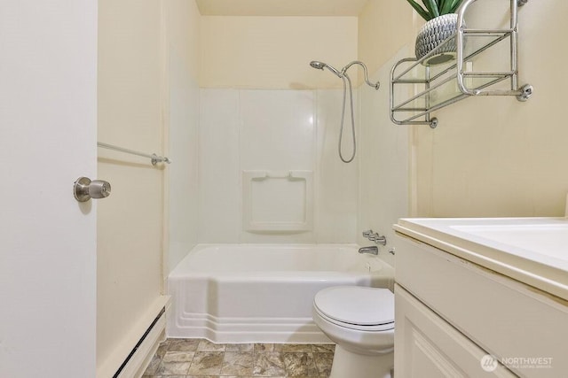 811 E 60th St, Tacoma, WA 98404 - full bath with vanity, toilet, a baseboard radiator, and bathing tub / shower combination