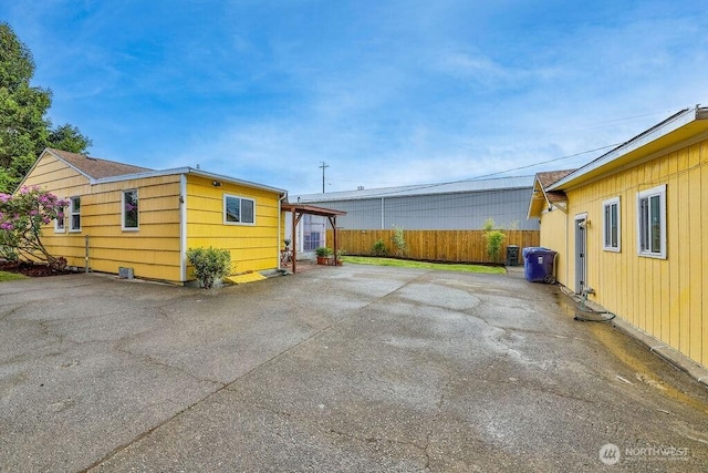 811 E 60th St, Tacoma, WA 98404 - view of side of property featuring cooling unit