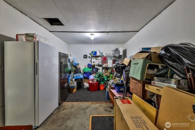 811 E 60th St, Tacoma, WA 98404 - interior space with freestanding refrigerator